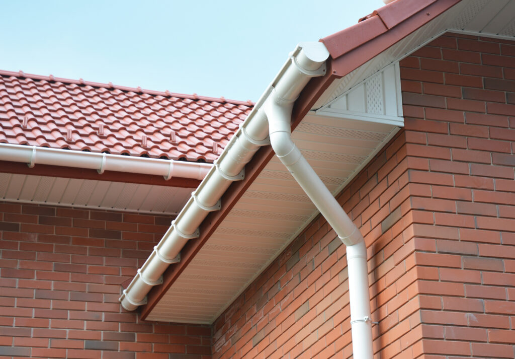 Close up view on House Problem Areas for Rain Gutter Waterproofing Outdoor. Home Guttering, Gutters, Plastic Guttering System, Guttering & Drainage Pipe Exterior