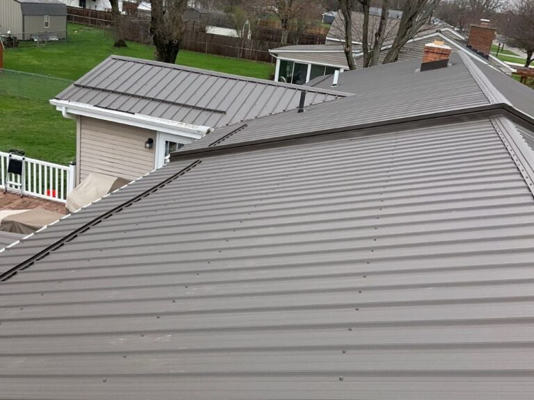 metal roofing options Keim Quality light grey metallic roof winter time