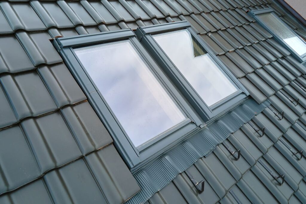 skylight installation close up metallic tiles